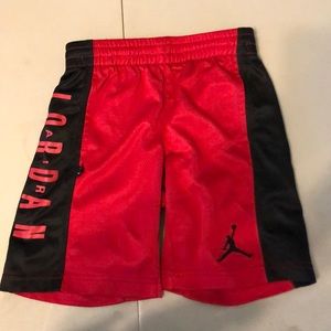 Boys Jordan red and black shorts